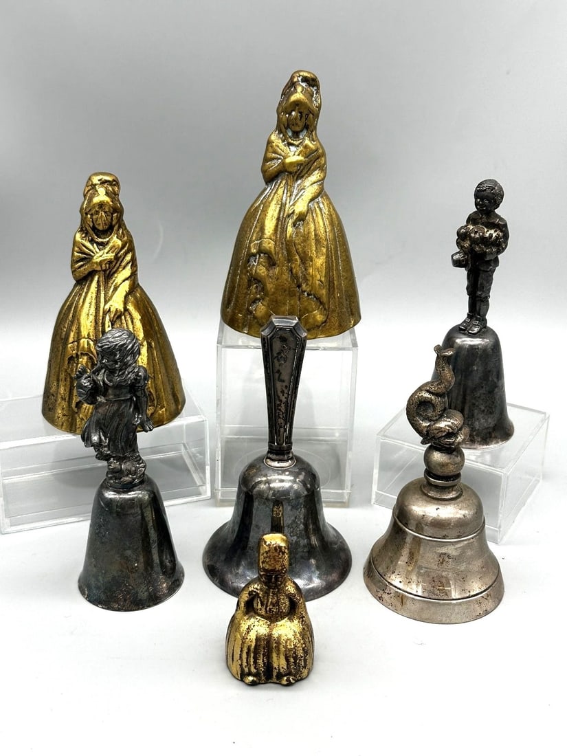 (7) Figural Brass & Silver Plate Bells; Reed and Barton, Others: (7) Figural Brass & Silver Plate Bells; Reed and Barton, Others; Includes brass ladies 4" tall, Reed and Barton boy, and girl. Dolphin finial, man, plain bell with sterling handle.
