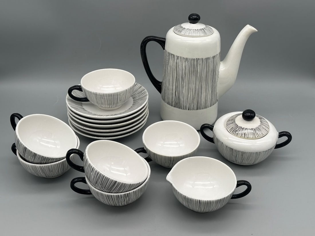 Mid Century Modern Luncheon Coffee Set: Mid Century Modern Luncheon Coffee Set: Made in Italy includes coffee pot, creamer and sugar, 6 cups and saucers. Coffee pot measures 6.5" tall.