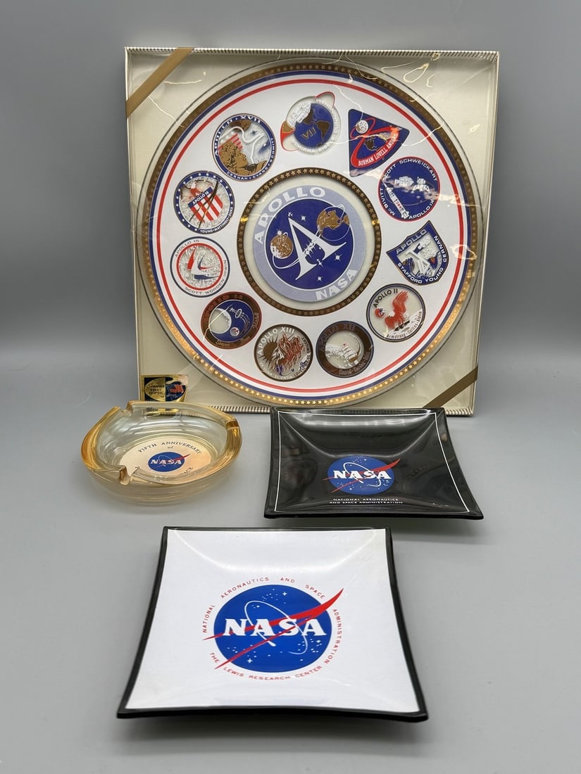 Group of NASA Collectibles: Ashtrays, Apollo Plate OB: Group of NASA Collectibles: Ashtrays, Apollo Plate OB: Includes (2) ashtrays white and black 5" square. (1) ashtray clear 4.25" in diameter, Apollo plate in OB 10.5".