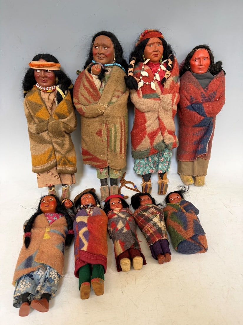(9) Group of Native American Skookum Dolls: Group of Native American Skookum Dolls: (6) with wooden feet. Measuring 6"-16".