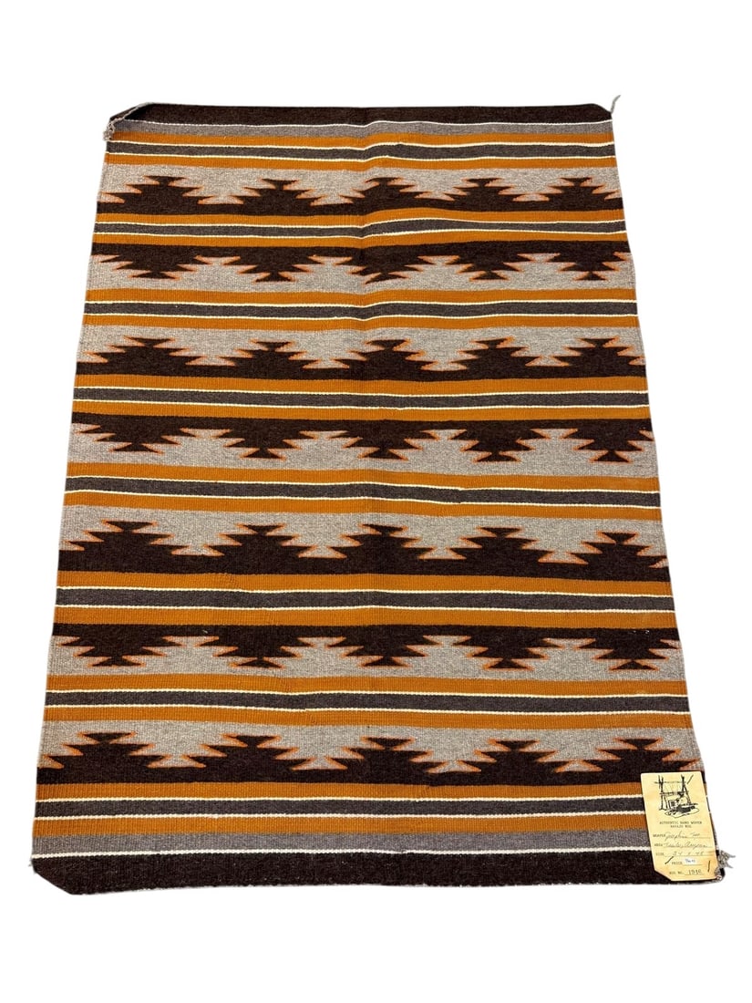 Authentic Hand Woven Navajo Rug: Athentic Hand Woven Navajo Rug by Weaver Josephine Tso, from Tsaile, Arizona. This rug has it's original tag indicating rug no. 1946 and measures 34" x 48". This Navajo rug is in excellent condition.