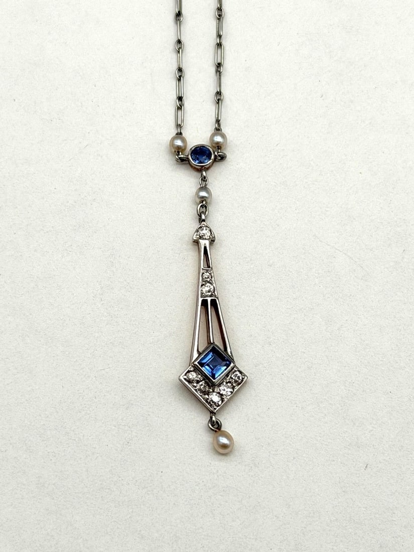 14k Gold Drop Dangle Pendant Necklace: 14k Gold Drop Dangle Pendant Necklace: Very Art Deco in period and style with topaz and diamonds. Total weight is 4.19 grams.