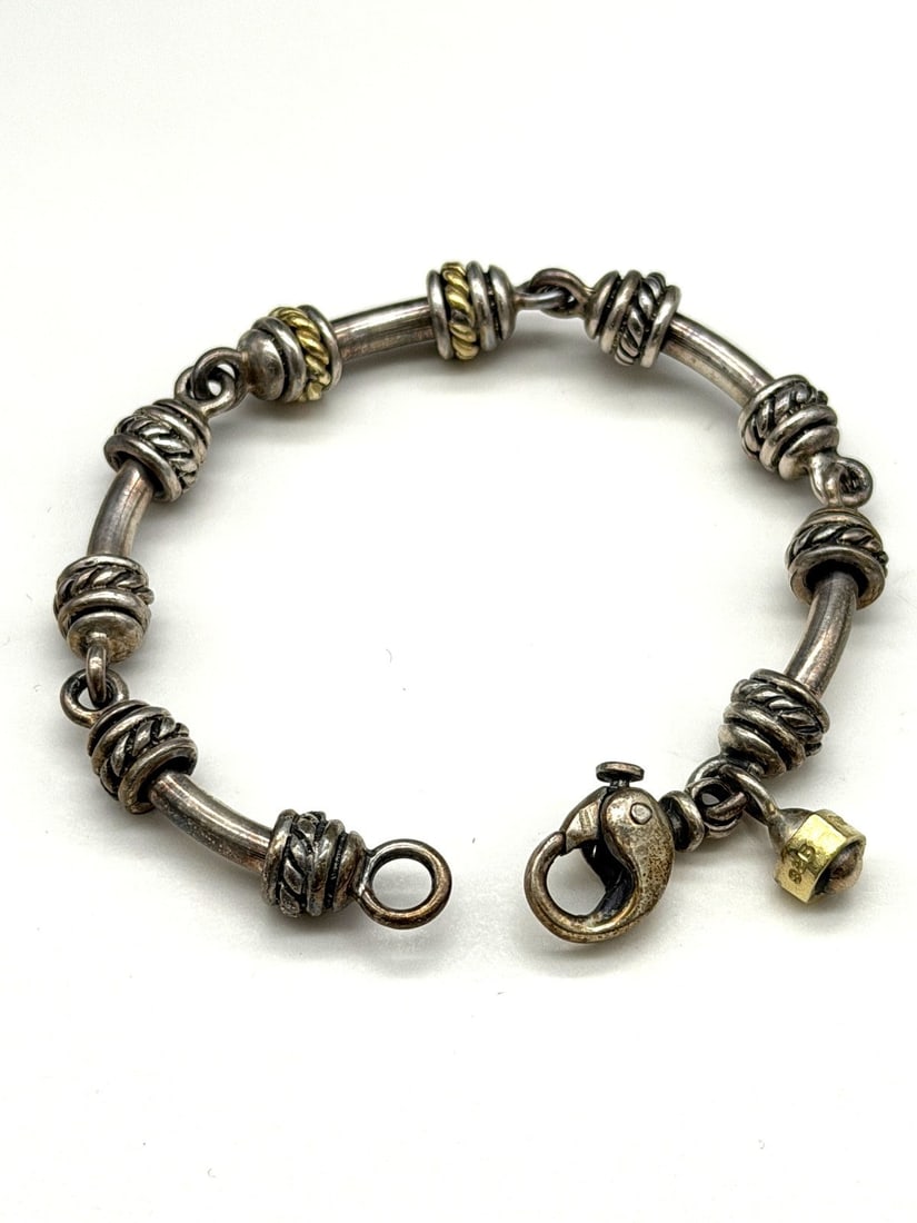 David Wysor Sterling Silver, 18k Gold Link Bracelet: David Wysor Sterling Silver, 18k Gold Link Bracelet: 7" long.