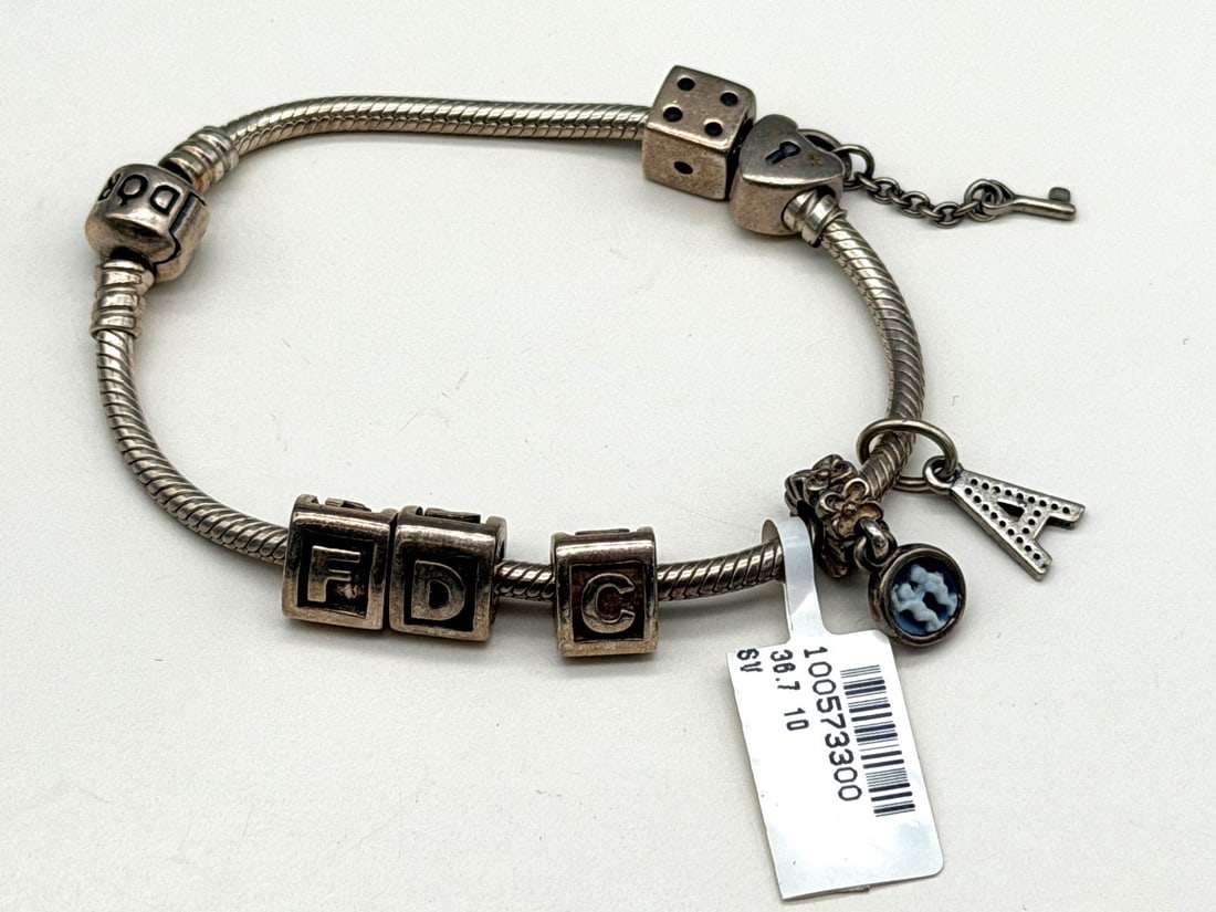 Pandora Sterling Silver Bracelet with 7 Charms: Pandora Sterling Silver Bracelet with 7 Charms