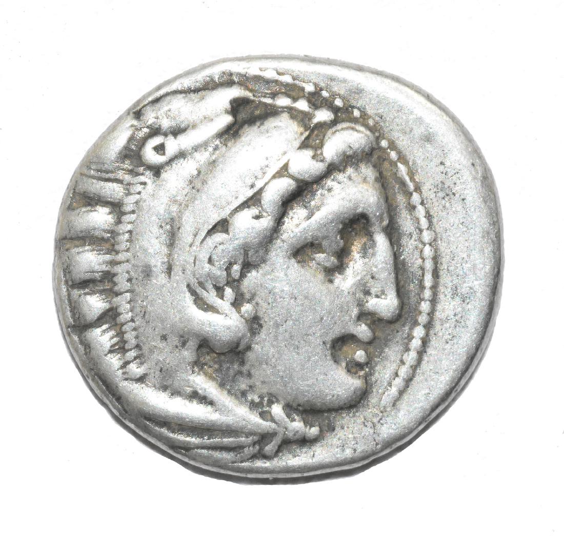 Alexander III, AR drachm, Cabyle mint. Posthumous: Alexander III, AR drachm, Cabyle mint. Posthumous issue. Head of Herakles right, wearing lionskin headdress / BA?I?E?? A?EXAN??OY, Zeus seated left, holding eagle and sceptre. - 19mm, 4,32 grams - ca.