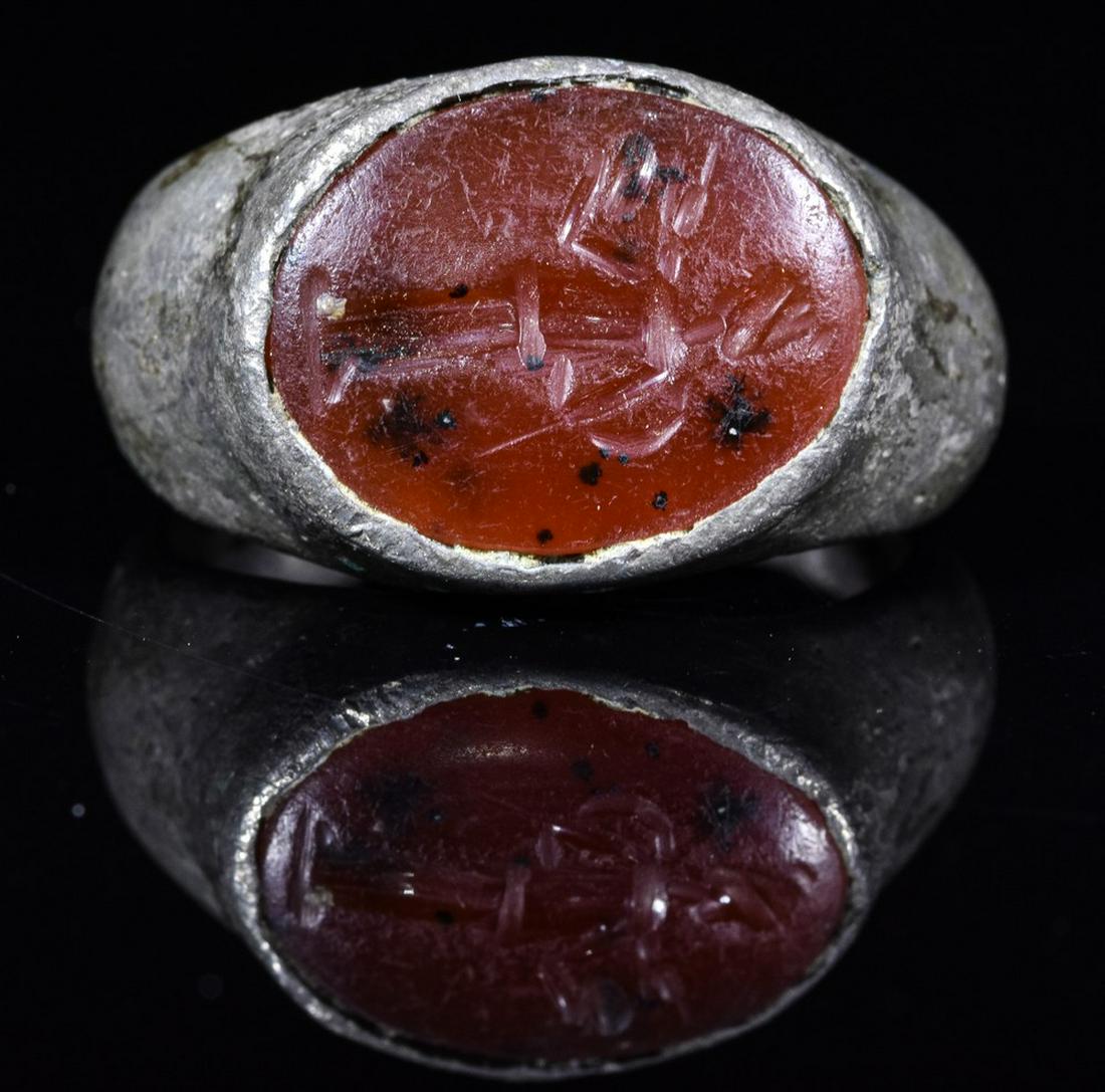 ROMAN SILVER INTAGLIO RING WITH GOD MERCURY: Ca.200 AD. Wearable Roman Silver Intaglio Ring. Mercury is a major god in Roman religion and mythology, being one of the 12 Dii Consentes within the ancient Roman pantheon. He is the god of financial 
