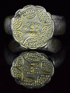 VIKING SILVER GILT RING WITH STAR OF GOD: Ca.1100-1200 AD. Wearable Viking (Swedish or Norwegian) Christian Silver Gilt Ring with a large circular bezel with punched hole decoration; central section decorated with a hexagram (six-pointed