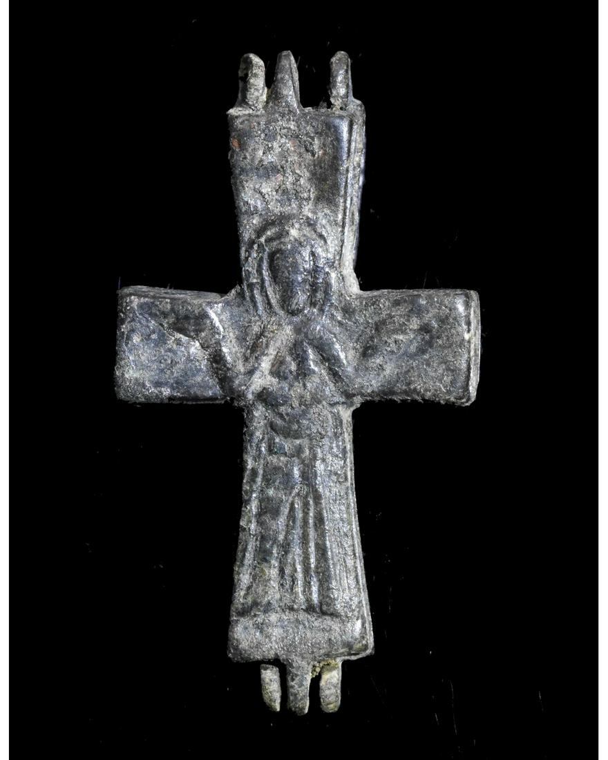 BYZANTINE BRONZE RELIQUARY CROSS: Ca.1000 AD. A bronze Byzantine Reliquary cross depicting Corpus Christi in high relief. Good Condition;wearable; 55x30 mm; 2.17x1.18in ; 18gr; Provenance: Private London collection, formed in the 1990