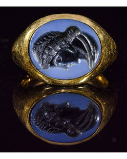 ROMAN GOLD NICOLO INTAGLIO RING WITH IMPERIAL PORTRAIT: Ca.100 AD. A fantastic Roman Gold Ring inserted with a Nicolo gemstone carved with an Imperial portrait; The style is Early and possibly represents Antonia (Mother of Claudius) .Good Condition; wearab