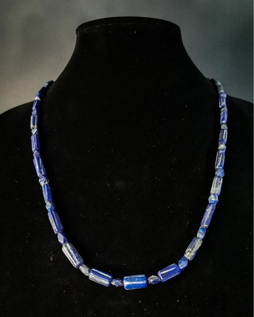 BACTRIAN LAPIS LAZULI NECKLACE: Ca.1000 BC. Bactrian necklace formed by tubular shapes beads strung in a hemp string. Good Condition; Size: 620mm;24.41in; 25gr; Provenance: Private Kent collection, formed in the 1980s on the UK art 