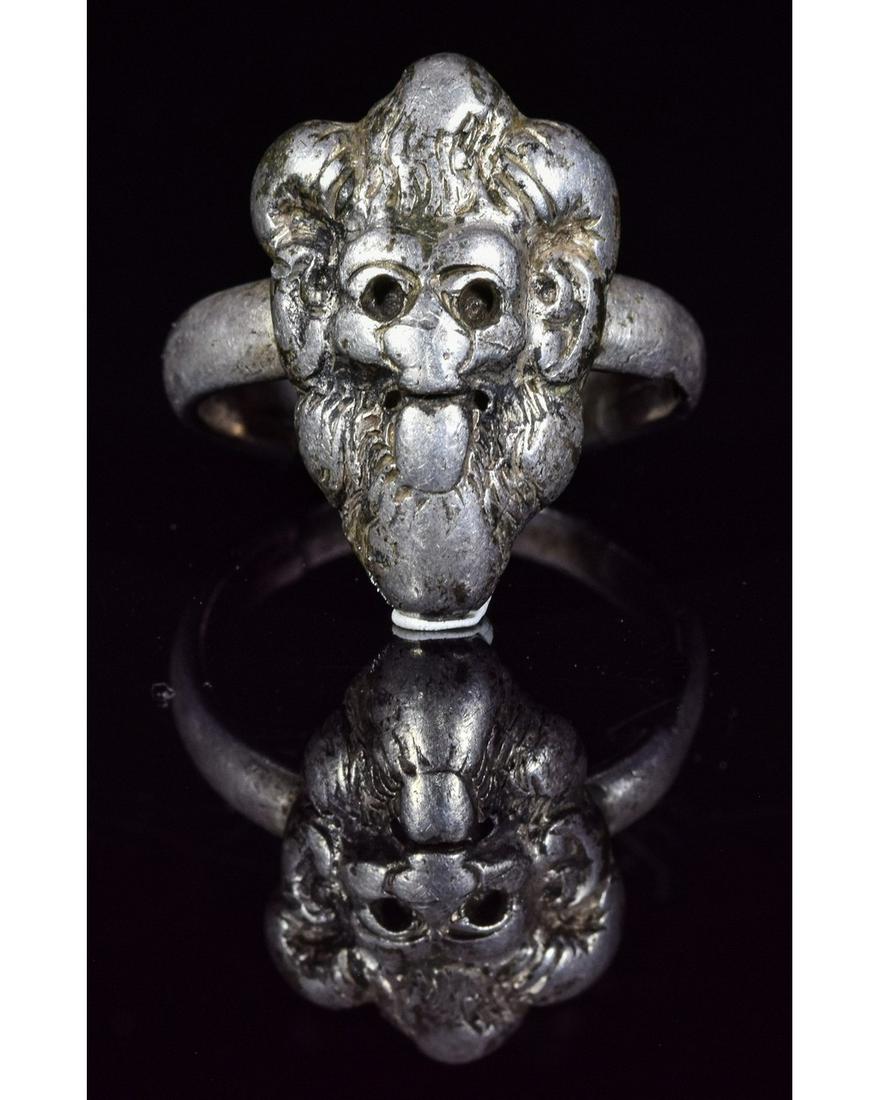 MEDIEVAL WITCHCRAFT SILVER RING WITH DEVIL'S FACE: Ca.1400 AD. Wearable Medieval Silver Ring with a Deamon's Head shaped Bezel. Possibly owned by someone practicing witchcraft, used as a sign of devotion to the Devil. Very few of these survived due to