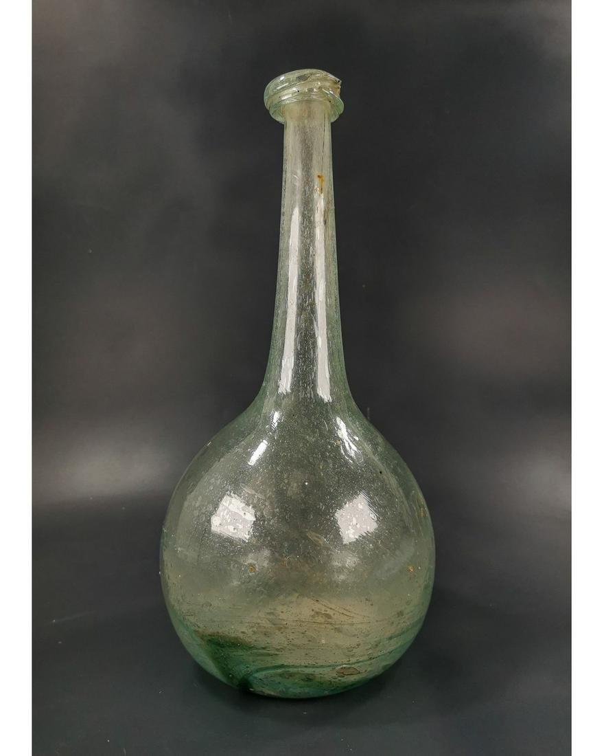 SUBSTANTIAL ROMAN TALL BOTTLE - 220MM: Ca.100 AD. Amazing Roman Glass blown tall Bottle, with bulbous wide body, thin delicate neck and flared rim; Good Condition. Intact; Size: 220x150mm;8.66x 5.91in; 690gr; Provenance: Property of a Lond