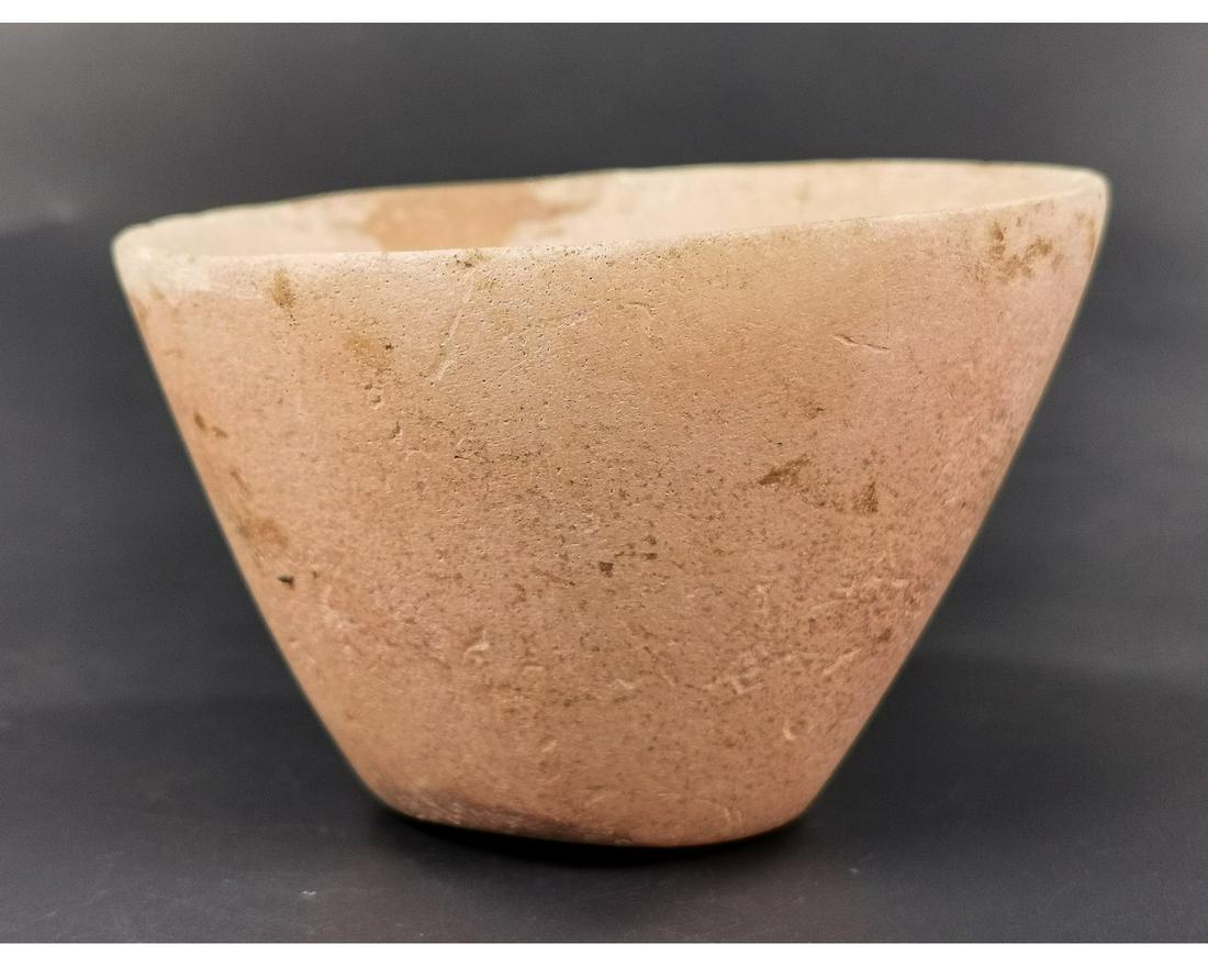 EGYPTIAN THICK CARVED ALABASTER BOWL: Ca. 3000 BC A Beautifully carved Egyptian alabaster bowl with slightly domed base, flared rim, and conical body. Good Condition;Size: 65x100mm; 2.56x 3.94in; 375gr; Provenance: Private London collecti