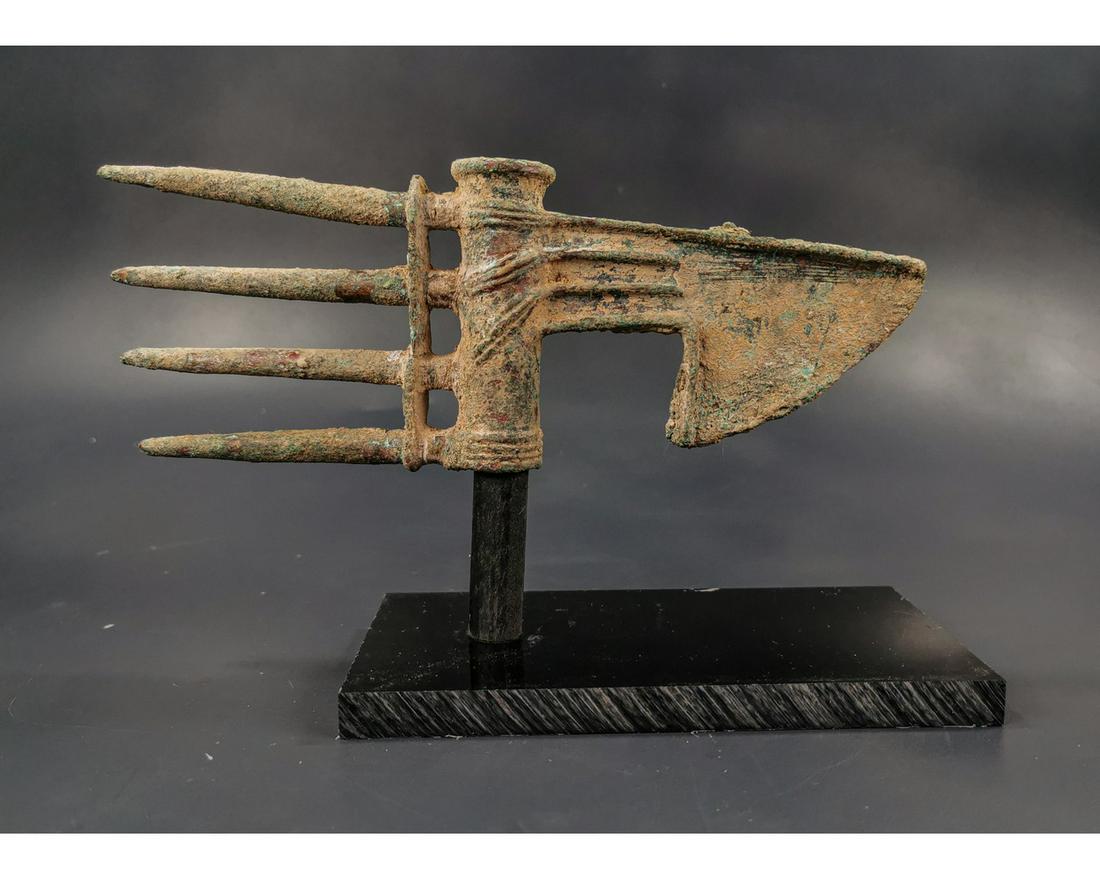 AMAZING BRONZE AGE SPIKED AXE HEAD: Ca.1600-1200 BC. Luristan; Beautifully crafted bronze spiked axe, with triangular blade tapering to a cylindrical shaft cast with horizontal ridges extending to form four long butt-spikes with joined 