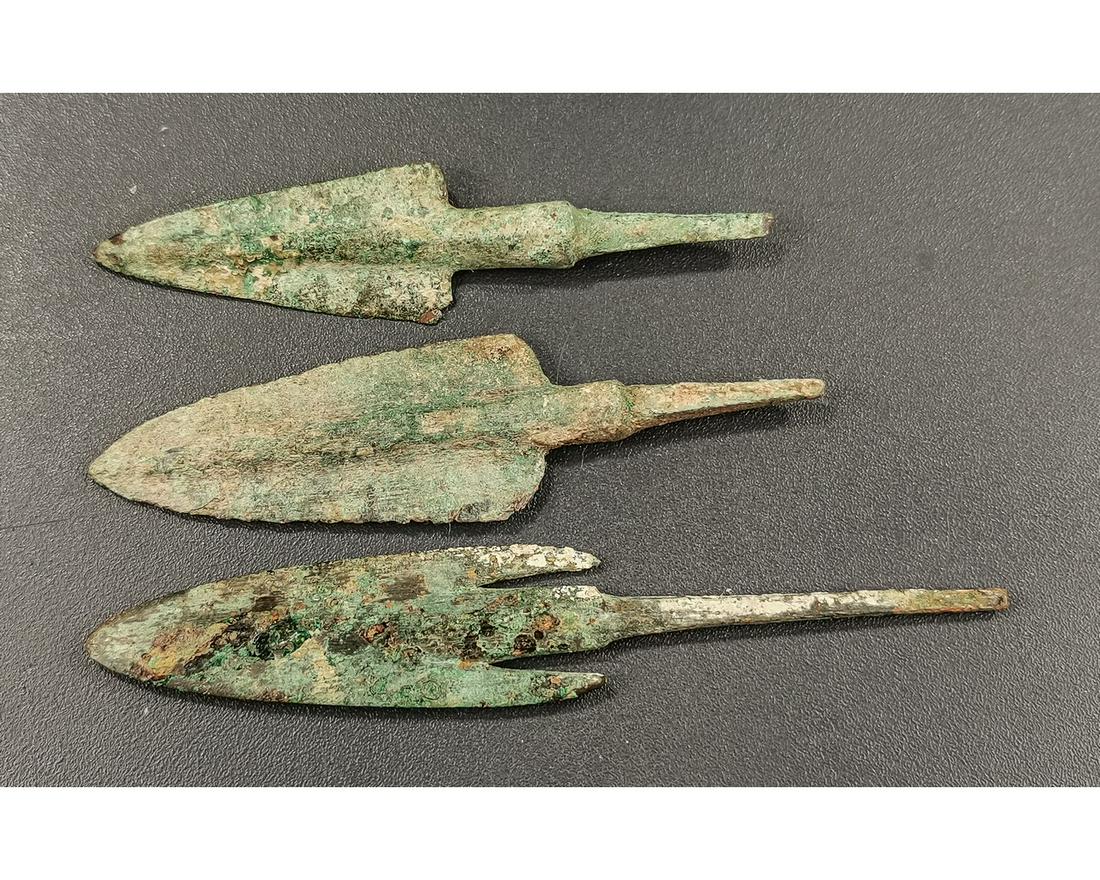 COLLECTION OF GREEK CYPRIOT BRONZE SPEARHEADS: ca. 2000–1900 B.C. Collection of Cypriot bronze spear heads (3). Cast bronze spears in amazing condition with a smooth green patina; Good Condition. 80-110mm; 3.15-4.33in; 45gr;Provenance: From an o