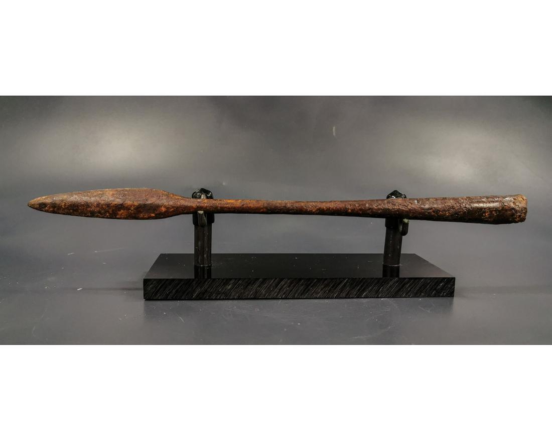 ANCIENT ROMAN SOCKETED SPEARHEAD: Ca.100 AD Well preserved Roman long iron spear of the type used by the Roman Auxiliary legions. Central ridge and short wide socket, the middle section remarkably free of rust, whereas the tip and bas