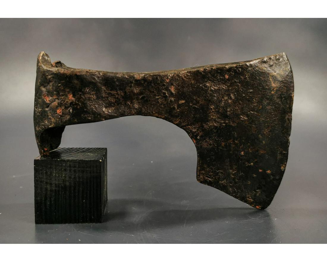 VIKING IRON BEARDED BATTLE AXE: Ca. 900 AD. Rare Medieval Scandinavian Iron Axehead with broad curved blade; Good condition; on a custom-made stand.Size: 170x100mm;6.69x 3.94in; 935gr;Provenance: Old British collection of Ancient we