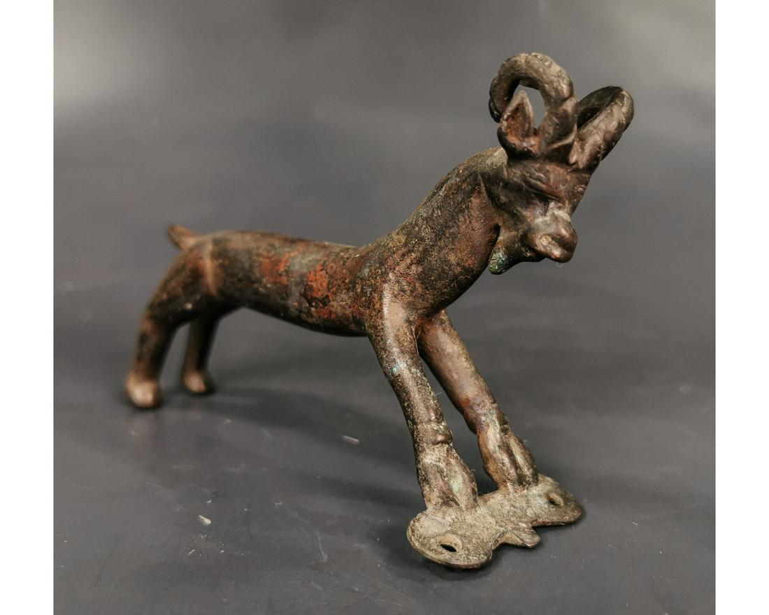 WESTERN ASIATIC BRONZE STATUETTE OF IBEX: Ca. 800 BC. Finely cast, Western Asiatic, Luristan figure of an ibex. Important animal in the Persian culture; often depicted on art and weapons. Fine condition, beautiful brown, smooth patina. Size: 