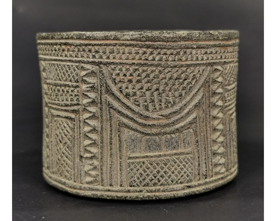 BACTRIAN DECORATED SCHIST STONE JAR: Ca.2500 - 2250 BC. Skillfully carved Schist Stone Jar with elaborate decoration. Good Condition, intact; Size: 80x55mm; 3.15x 2.17in; 280gr; Provenance: Private Kent collection, formed in the 1980s on