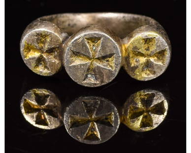 RARE MEDIEVAL SILVER GILT SEAL RING WITH CROSSES: CA. 1200 AD Very Rare Crusaders period silver gilt religious ring; composed by a round hoop forming three bezels; each one depicting a Maltese-shaped cross. Possibly owned by a Knight Hospitaller.