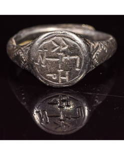 MEDIEVAL SILVER RING WITH CHRISTIAN MONOGRAM: CA. 1200 AD Rare Crusaders Period silver ring; composed of the round hoop, forming an oval bezel; depicting a Christian monogram. Good, wearable condition; D: 18mm/L:25mm; UK P US 8; 6gr; Provenance: