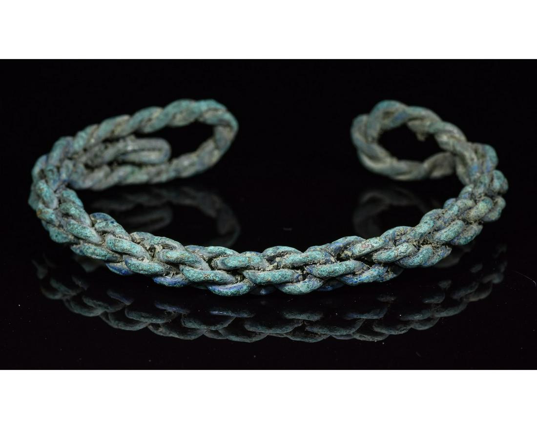 VIKING ERA TWISTED BRONZE BRACELET: Ca.900-1100 AD. Wearable, Early Medieval, Viking twisted bracelet - "Arm Ring". Such type of bracelet was given to the young male children as a symbol of their transition to men. The type is also know