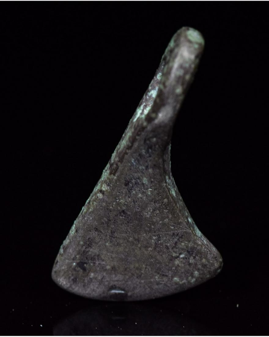 VIKING PERIOD SILVER AXE AMULET: Ca.700-900 AD. A fine Viking Scandinavian skeuomorphic amulet shaped as a bearded axe with an intact loop; Reference for Viking Jewellery: Cf. Arbman, H. Birka I: Die Gräber, Uppsala, 1940; Good cond