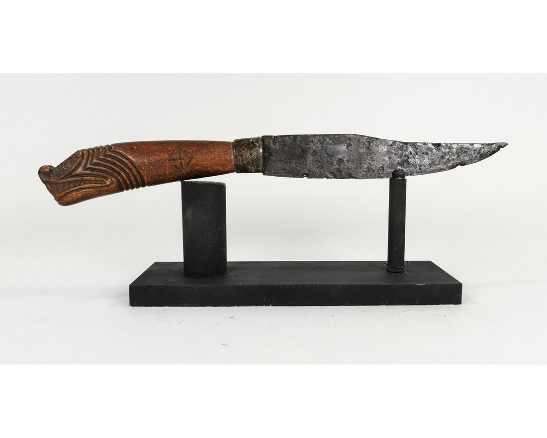 VIKING IRON KNIFE WITH DRAGON HANDLE: Ca. 900 AD. Medieval, long and thin knife, expertly cleaned and conserved; professionally reconstructed, hand-carved bone handle depicting the mythological dragon – Fafnir; including custom made sta