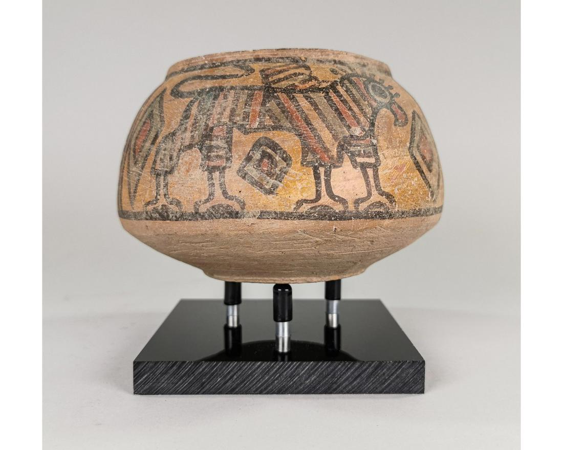 INDUS VALLET TERRACOTTA VESSEL WITH ANIMALS: Ancient Central Asia, Indus Valley, ca. 3rd millennium BCE. An interesting Polychrome terracotta storage jar, decorated with zebu bull and griffin. Reference for Indus Valley Pots: Satyawadi, N. Proto