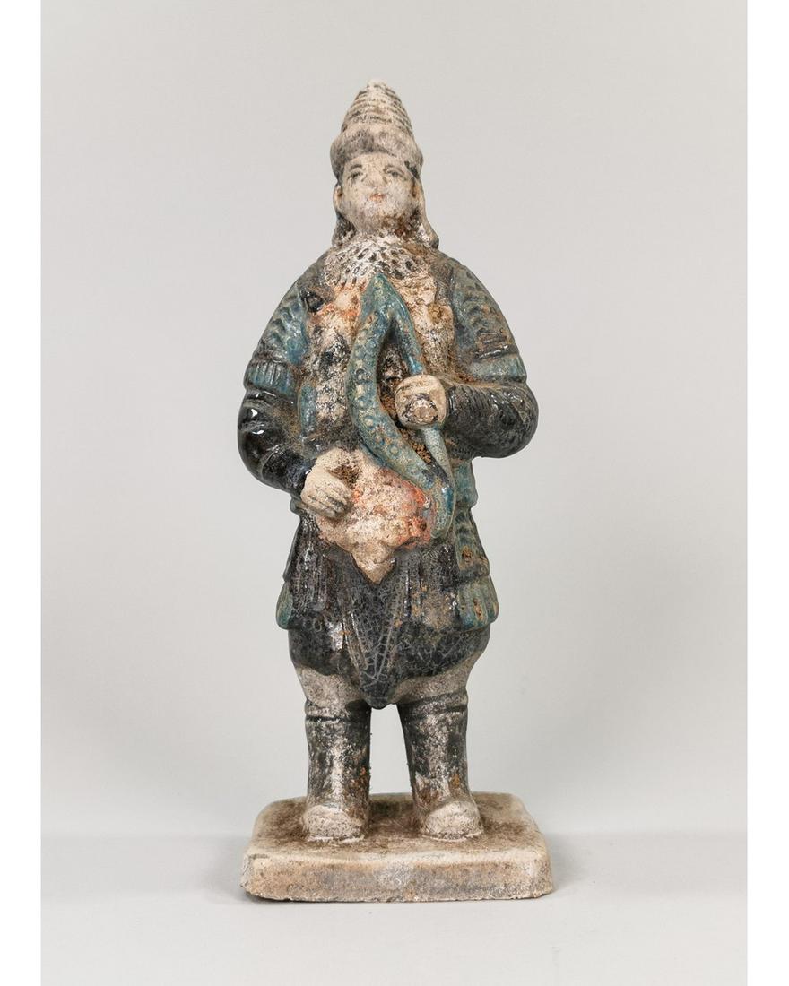 CHINESE MING DYNASTY TERRACOTTA FIGURINE: Ca. 1368-1644 AD. Amazing cobalt blue glazed terracotta figurine. Male Warrior figurine, with cobalt blue glazed armor holding a bow.Good condition, intact, original glazing; 235 mm; 9.25195 in; 547g;