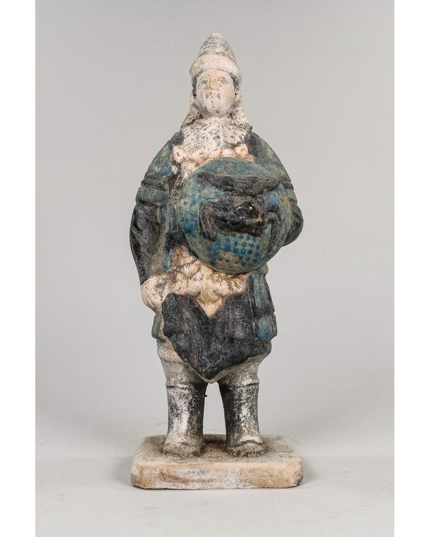 CHINESE MING DYNASTY TERRACOTTA FIGURINE: Ca. 1368-1644 AD. Amazing cobalt blue glazed terracotta figurine. Male Warrior figurine, with cobalt blue armor holding a shield.Good condition, intact, original glazing; 230 x 85 mm; 9.0551x3.34645 i