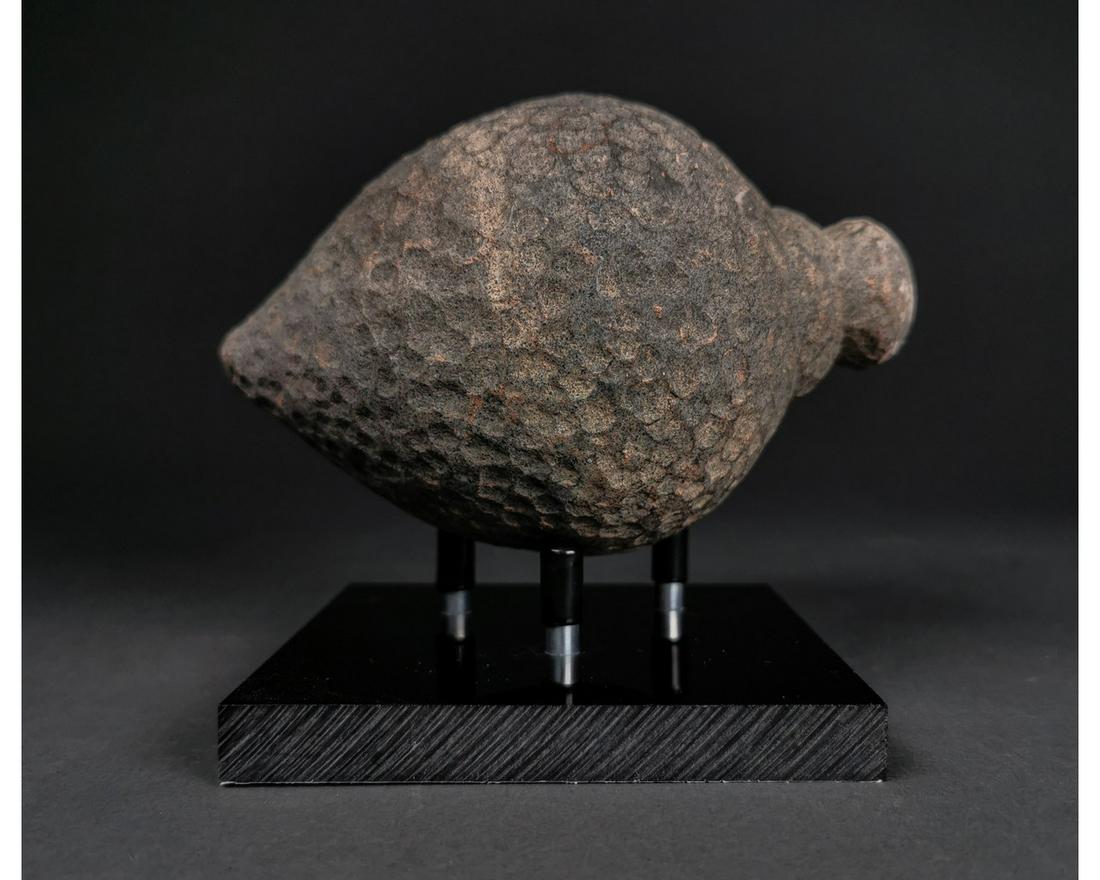 ANCIENT "GREEK FIRE" CERAMIC GRENADE: Ca.800 AD. A hollow ceramic Vessel with a barrel-shaped body, domed top, and conical base, knop to the upper face for the mouth; Good Condition;Size:245mmx85mm;377g;Provenance: Private Somerset Estate