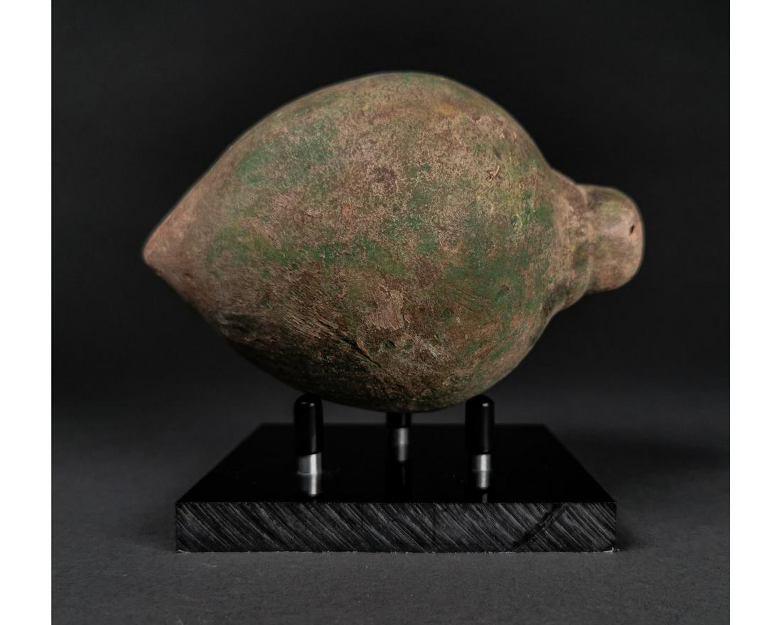 ANCIENT "GREEK FIRE" CERAMIC GRENADE: Ca.800 AD. A hollow ceramic Vessel with a barrel-shaped body, domed top, and conical base, knop to the upper face for the mouth; Good Condition;Size:145mmx85mm;400g; Provenance: From an old British co