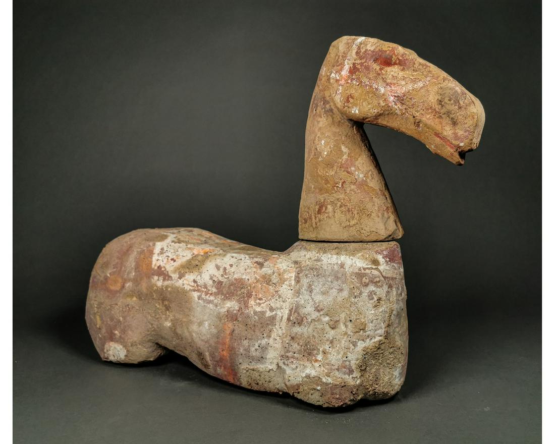 ANCIENT CHINESE HAN DYNASTY HORSE: Ca. 206 BCE to 220 CE; East Asia, China, Han Dynasty. An interesting Chinese terracotta horse with sockets to the shoulders and hips to accept separate legs, socket to the rum for the tail; head erect