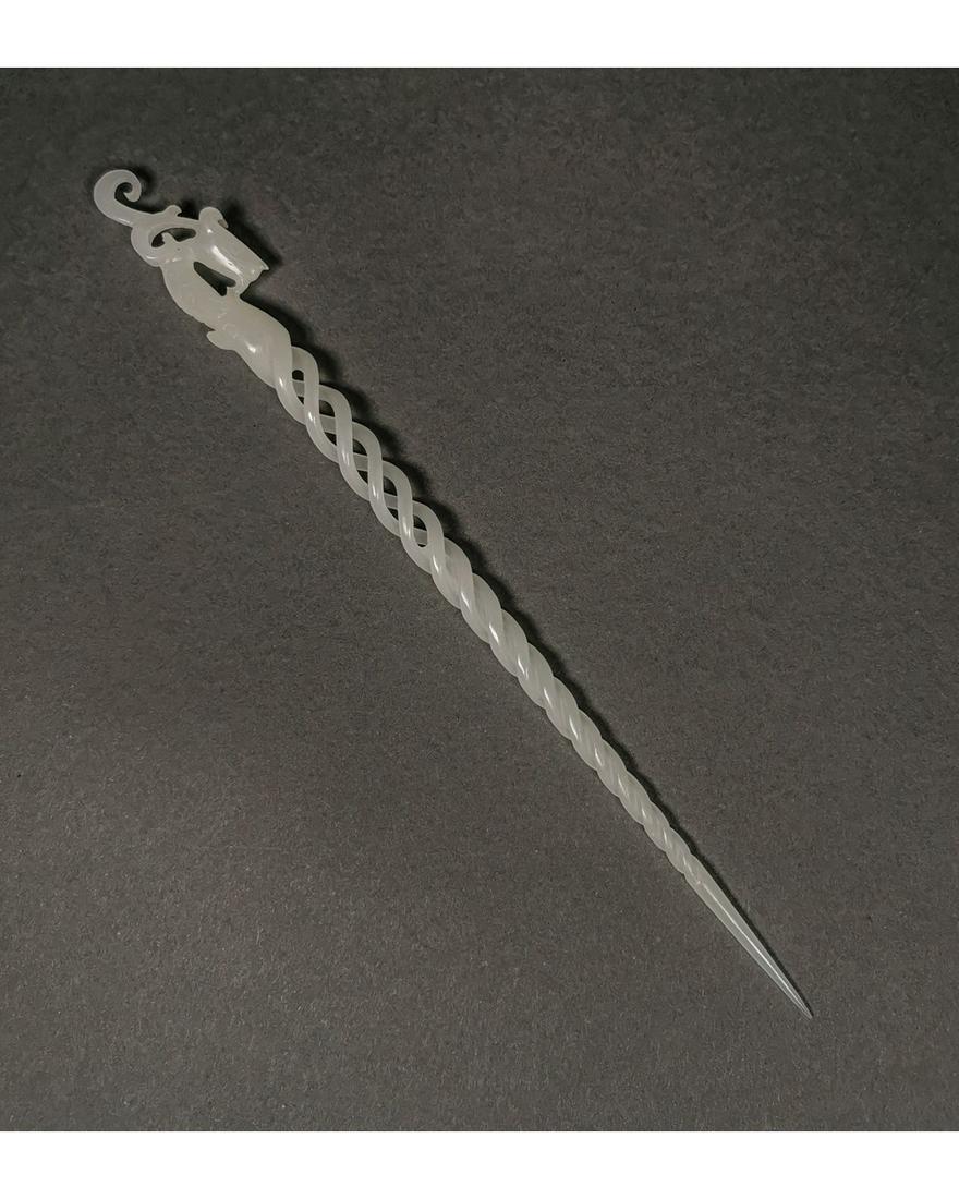 CHINESE CARVED JADE DRAGON PIN: Ca.20th century AD or earlier /Qing Dynasty style. A nice example of Chinese craftsmanship; an elaborately carved hair pin made of celadon jadeite; an open-work spiral design surmounted by a dragon-sh