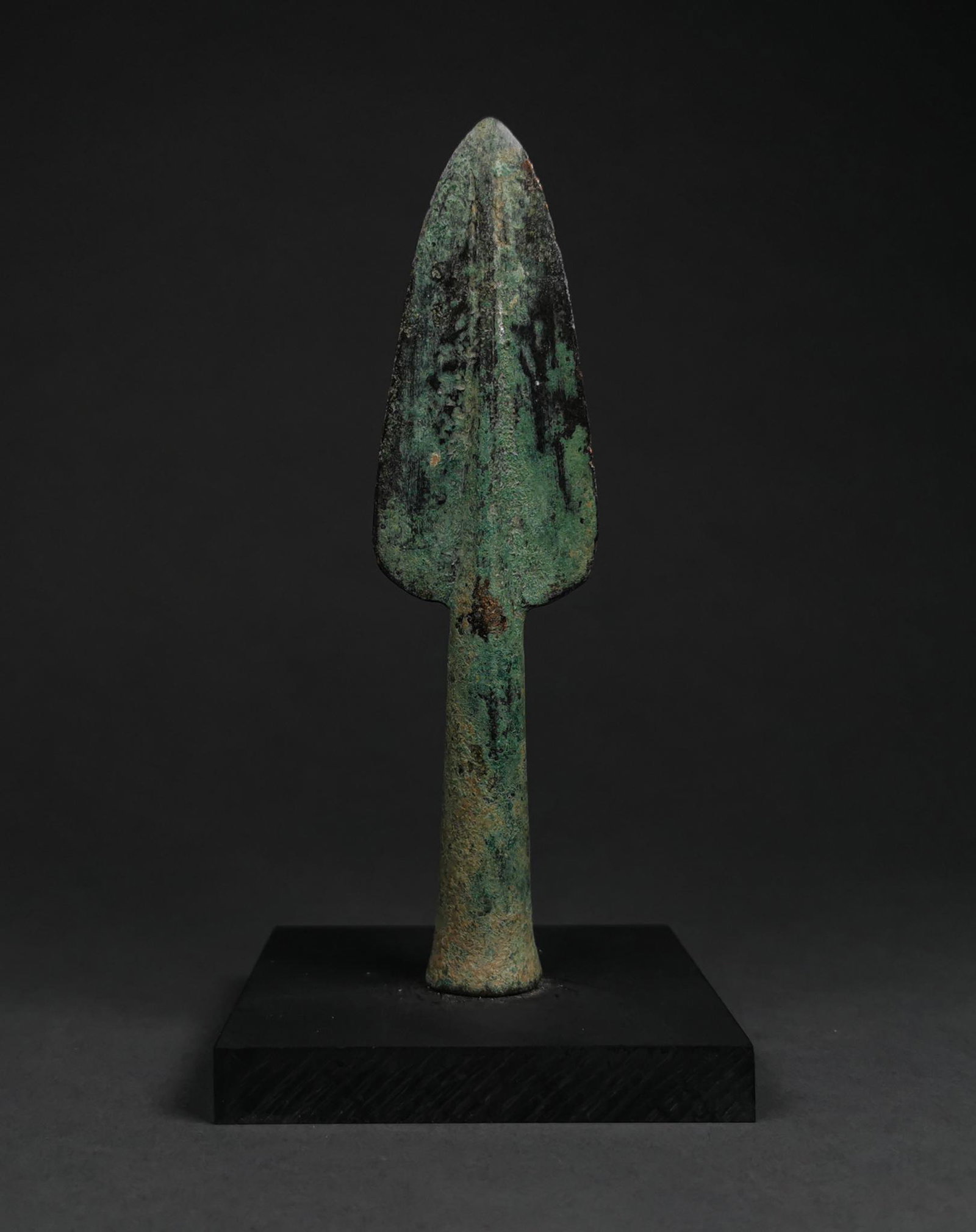 ANCIENT GREEK HOPLITE SOCKETED SPEAR: 800 – 600 BC. Greek Hoplite Period. Bronze spearhead comprising a substantial leaf-shaped, lentoid-section blade with raised midrib and medium neck and a beautiful green patina. Hoplites were the ci