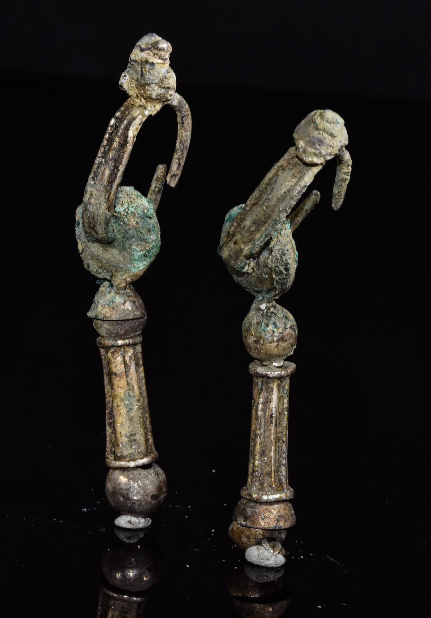 PAIR OF VIKING SILVER EARRINGS: C. 900-1100 AD. Viking Period. These beautiful silver drop earrings of geometric design with cylindrical, spheroid and disk-shaped elements. This simple yet elegant ornament may have belonged to a V