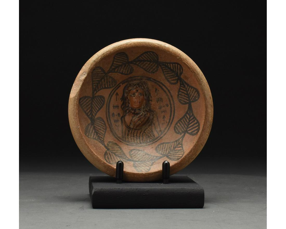 RARE INDUS VALLEY PAINTED PLATE WITH GODDESS AND SCRIPT: C. 3rd millennium BC. Ancient Central Asia, Indus Valley. An excellent example of an Indus Valley civilisation bowl, with a truncated conical and flattened base. while the interior of the bowl feature