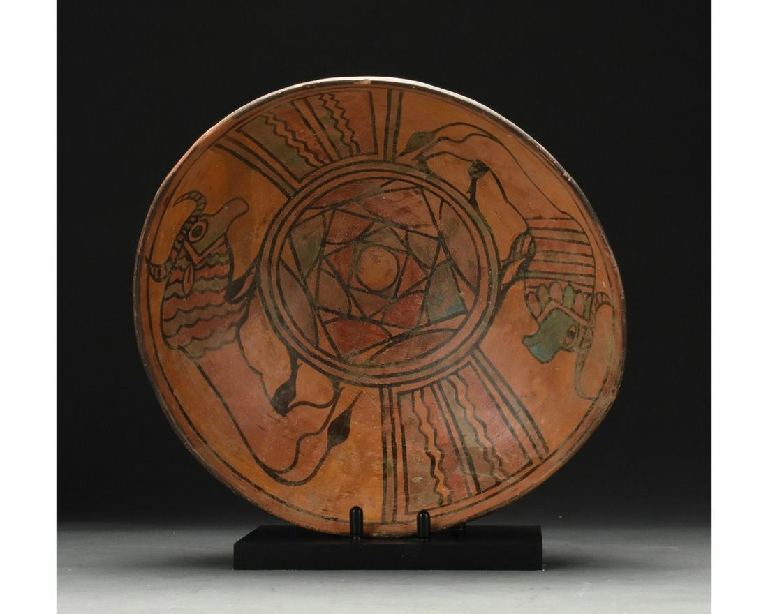 LARGE INDUS VALLEY PAINTED BOWL WITH ANIMALS: C. 3rd millennium BC. Ancient Central Asia, Indus Valley. A large example of an Indus Valley civilisation bowl, with a lightly flaring body and a ring base. The interior of the vessel is decorated wit