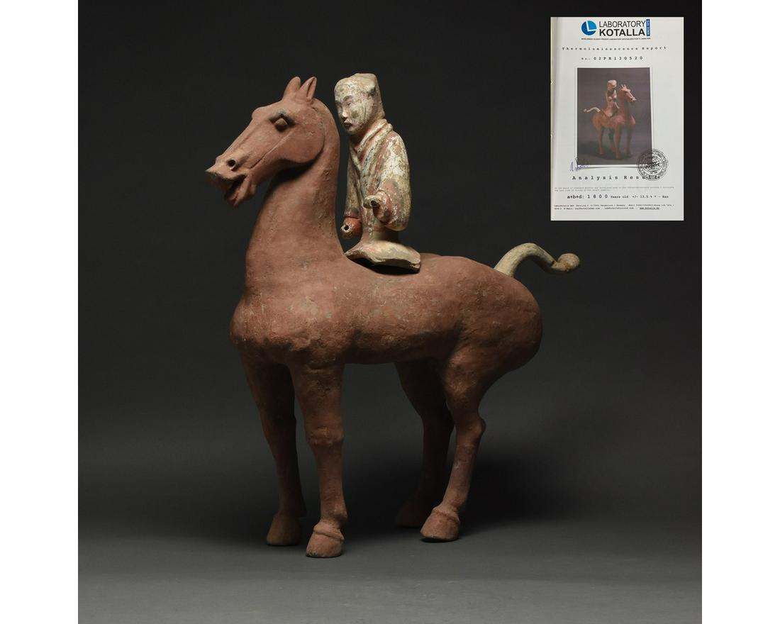 LARGE CHINESE HAN DYNASTY HORSE AND RIDER - TL TESTED: Ca. 202 BC-220 AD. Chinese Han Dynasty. Terracotta Horse with Rider. An elegant hollow-moulded terracotta horse. This brown horse is modelled in a standing pose with its neck elegantly arched, mouth a