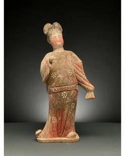 CHINA, TANG DYNASTY POTTERY COURT LADY - TL TESTED: C. AD 618-907. Tang Dynasty. Terracotta full-figured court lady who sways to one side and raises her right hand. This female figure is presented wearing court attire, or shenyi, which comprises a