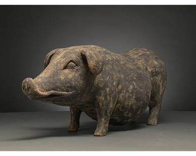 CHINA, HAN DYNASTY POTTERY BLACK PIG - TL TESTED: Ca. 206 BC - 220 AD. Han dynasty. A hollow-formed terracotta pig in a cream fabric with a painted black topcoat. The pig’s features have been beautifully modelled and carefully incised detail is