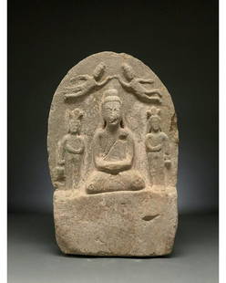 CHINA, TANG DYNASTY STONE STELE WITH BUDDHA: C. AD 618-907. Tang Dynasty. A cream-coloured, oval-shaped stone stele in high relief depicting a seated buddha. The central Buddha figure is depicted in a highly stylised manner; he is shown seated,