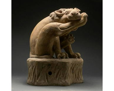 LARGE CHINESE TANG DYNASTY POTTERY LION - TL TESTED: Ca. 618 - 907 AD. Chinese Tang Dynasty. A playful terracotta sculpture of a male lion, with a delicately modeled mane is depicted sitting on his haunches, with one foot stretched forward as if to