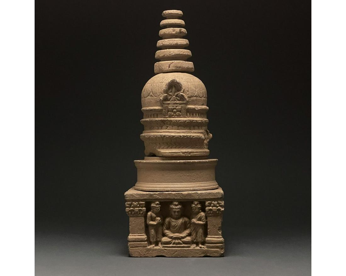 SUPERB GANDHARA SCHIST STONE STUPA: 100-300 AD. Gandharan. A superb stone reliquary stupa comprising superimposed disk-shaped segments of progressively smaller size atop a domed tower; this sits on a cylindrical drum which is itself sup