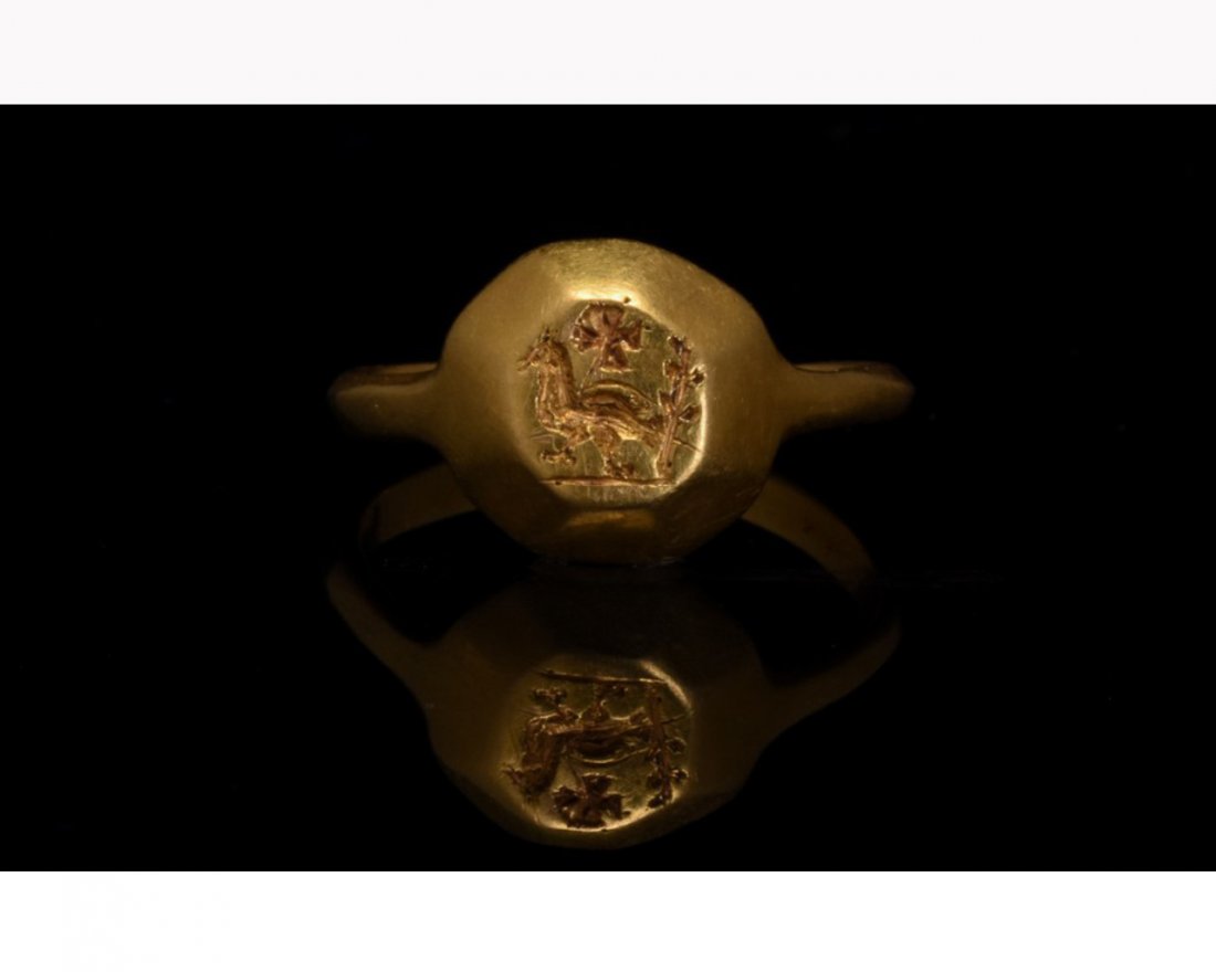BYZANTINE GOLD RING WITH BIRD AND CROSS - XRF TESTED: CA. 600 AD. BYZANTINE GOLD RING WITH BIRD AND CROSS. In order to confirm its authenticity, this piece has undergone X-Ray Fluorescence analysis by an independent Belgian Laboratory. The samples collec