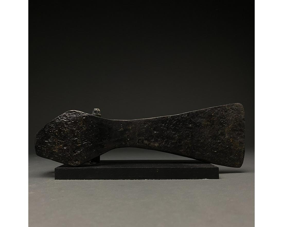 VIKING IRON BATTLE AXE HEAD: c. 900-1100 AD. Viking age. An iron axe head comprising a wedge-shaped blade, tapering cheek, reinforced poll and rounded socket. The era known as the Viking age lasted for more than 300 years, from t