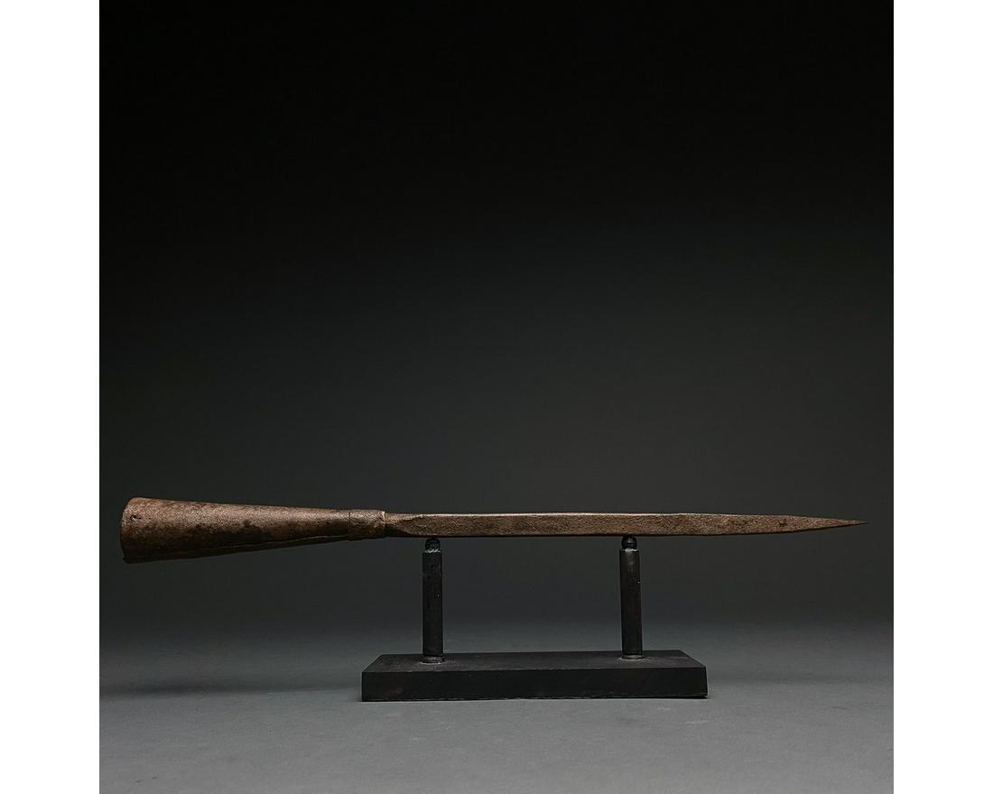 VIKING AGE IRON SOCKETED SPEAR: C.800-1110. Viking Age. Iron spearhead with pyramidal blade and a gently flaring circular socket. Spears were an important component of Viking military equipment as their lightweight nature meant they