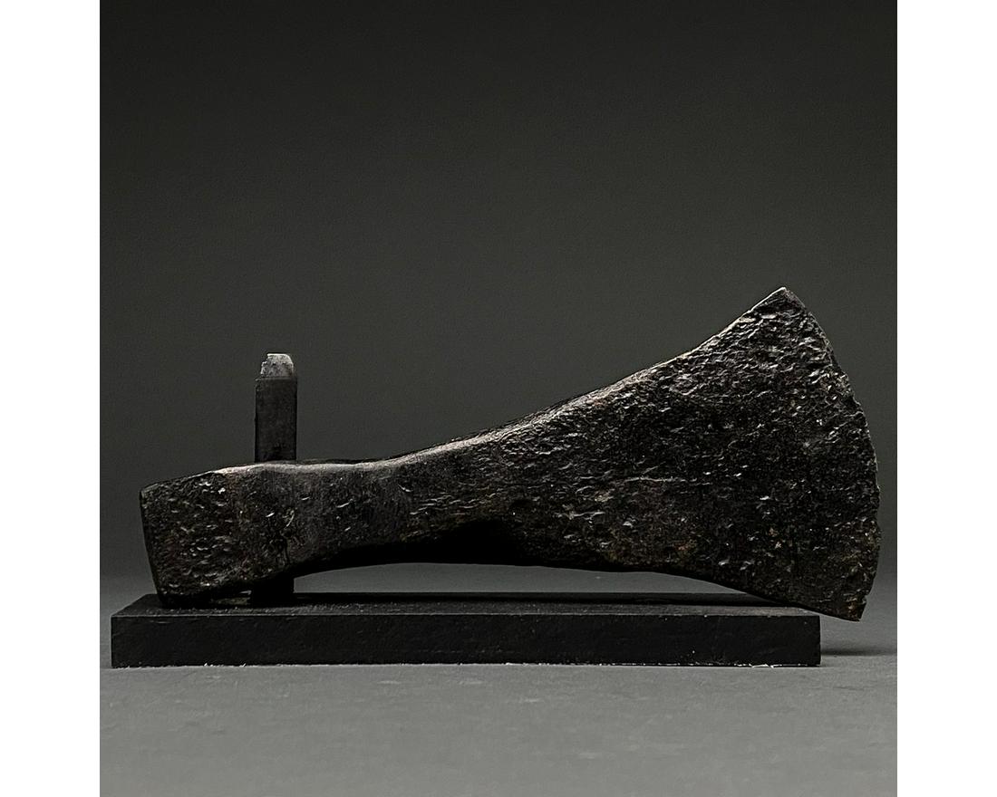 VIKING IRON BATTLE AXE HEAD: c. 900-1100 AD. Viking age. An iron axe head comprising a curved, fan-shaped blade, tapering cheek and rounded socket. The era known as the Viking age lasted for more than 300 years, from the late 8th
