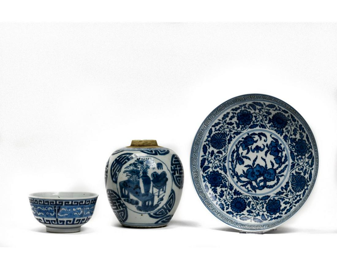 THREE CHINESE BLUE AND WHITE PORCELAIN VESSELS: THREE CHINESE BLUE AND WHITE PORCELAIN VESSELS. Beautiful set of Chinese blue and white porcelain featuring a plate, a small bowl and a large jar; all decorated with floral patterns and Chinese landsc